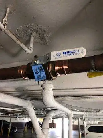 Copper pipe repair and valve work for Backflow Testing in Office Hall